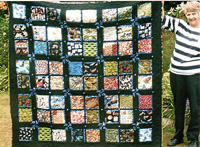 Priscilla's birds of a feather quilt small.jpg